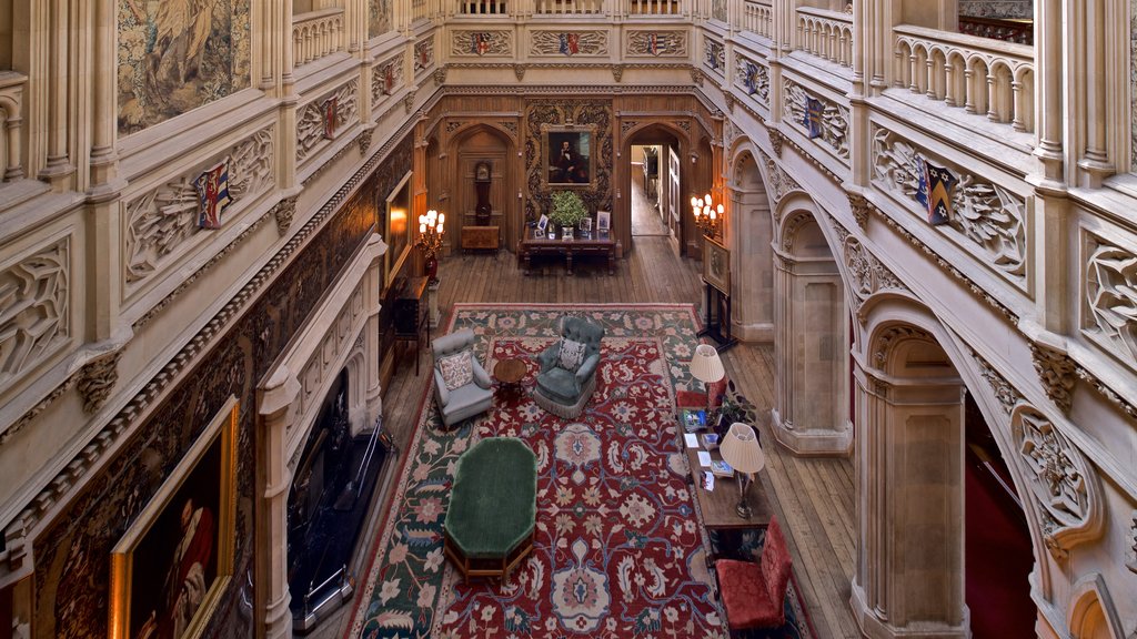 Highclere Castle featuring heritage elements, a house and interior views