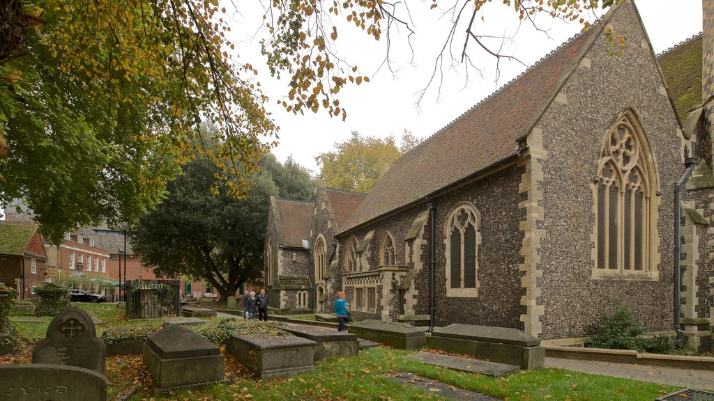 Minster Church of St Mary the Virgin featuring a church or cathedral, heritage architecture and a cemetery