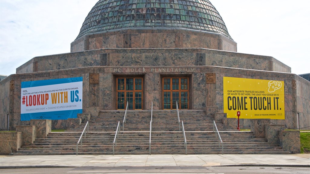 Adler Planetarium and Astronomy Museum featuring signage and modern architecture