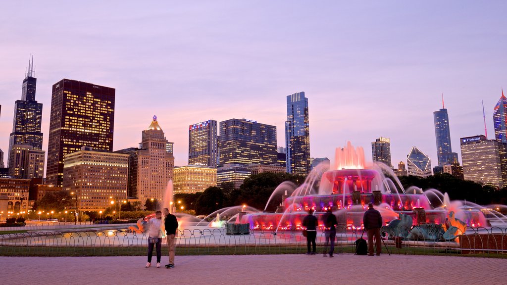 Buckingham Fountain featuring a high-rise building, a city and landscape views