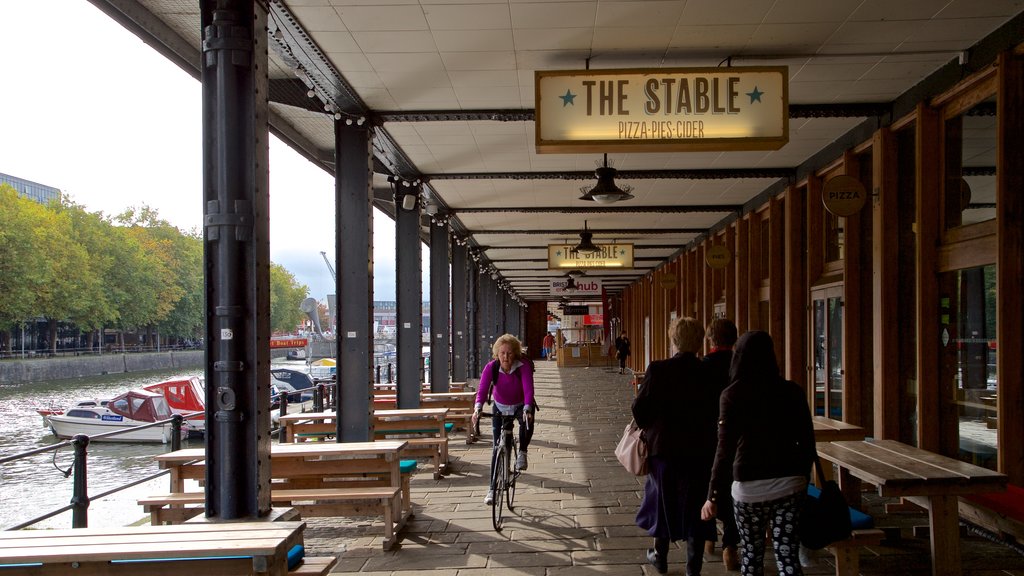 Watershed featuring signage and cycling as well as an individual femail