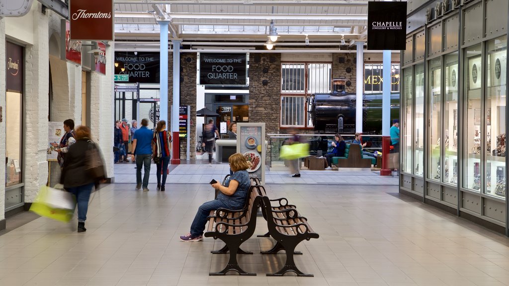 Swindon Designer Outlet which includes shopping and interior views as well as an individual femail