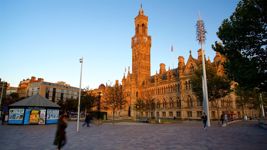 Bradford City Hall which includes heritage architecture and a sunset