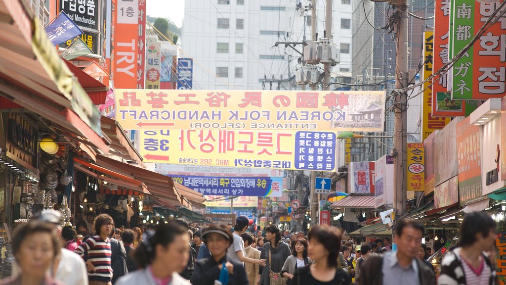 Namdaemun Market showing markets, a city and street scenes