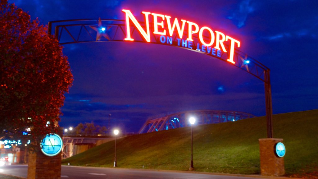 Newport on the Levee featuring signage and night scenes