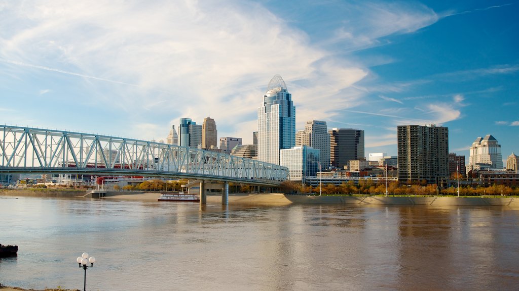 Newport on the Levee featuring a bridge, central business district and a river or creek