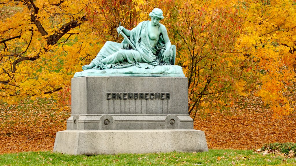 Spring Grove Cemetery showing a cemetery, fall colors and a statue or sculpture