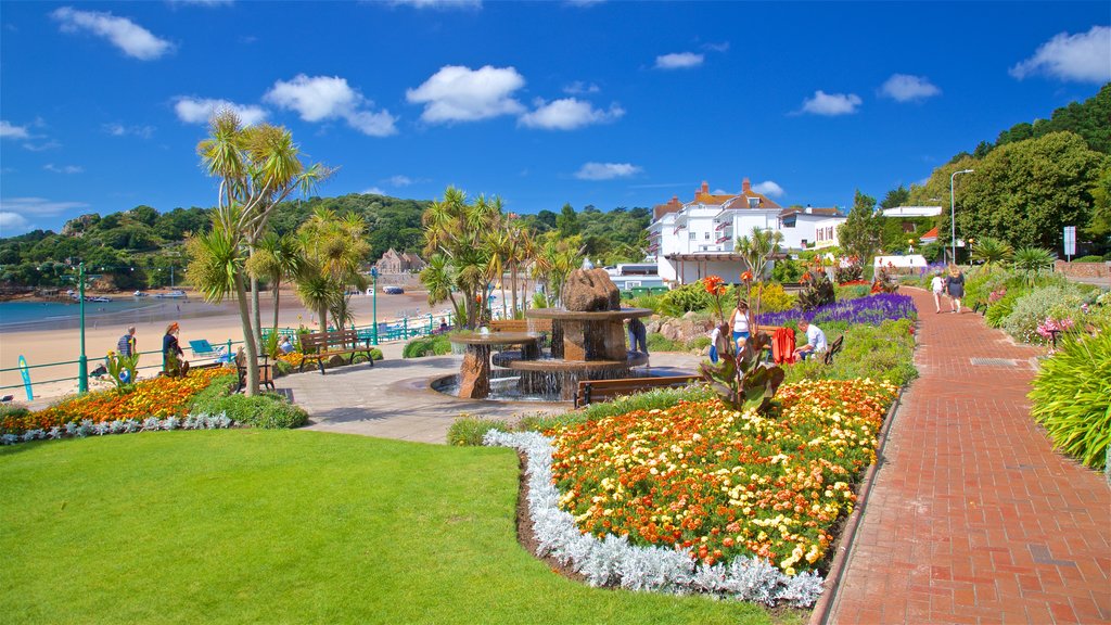 St Brelade\'s Bay Beach showing general coastal views, a garden and a fountain