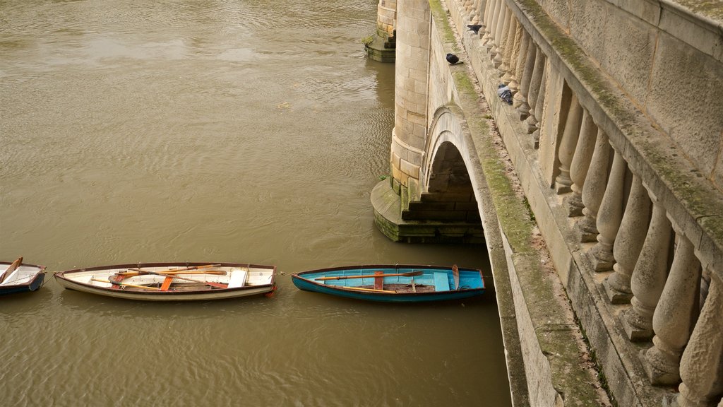 Richmond Bridge featuring a bridge and a river or creek