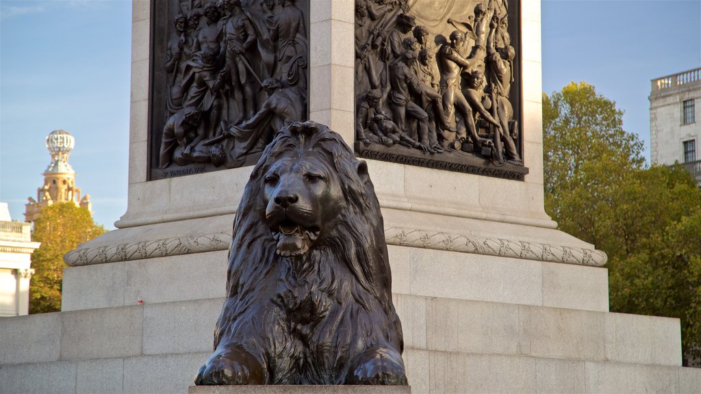 Trafalgar Square showing a statue or sculpture and heritage elements