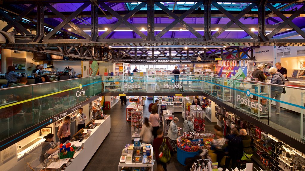 London Transport Museum featuring interior views as well as a small group of people