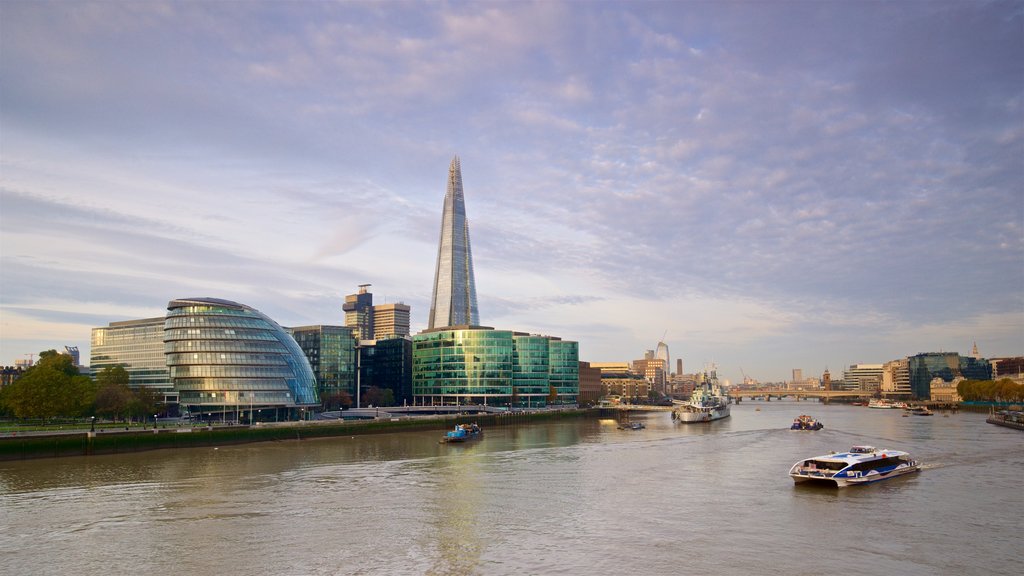 The Shard featuring a sunset, a ferry and modern architecture