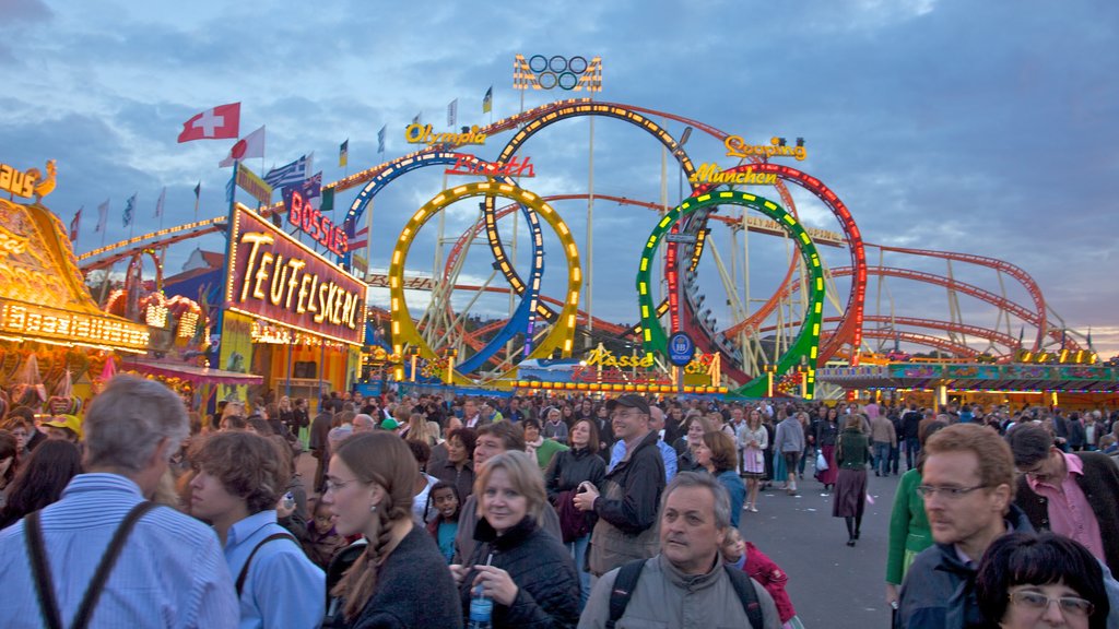 Munich showing rides as well as a large group of people