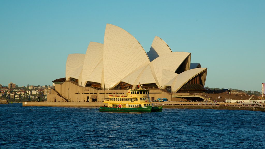 Circular Quay which includes a bay or harbour, a ferry and a city