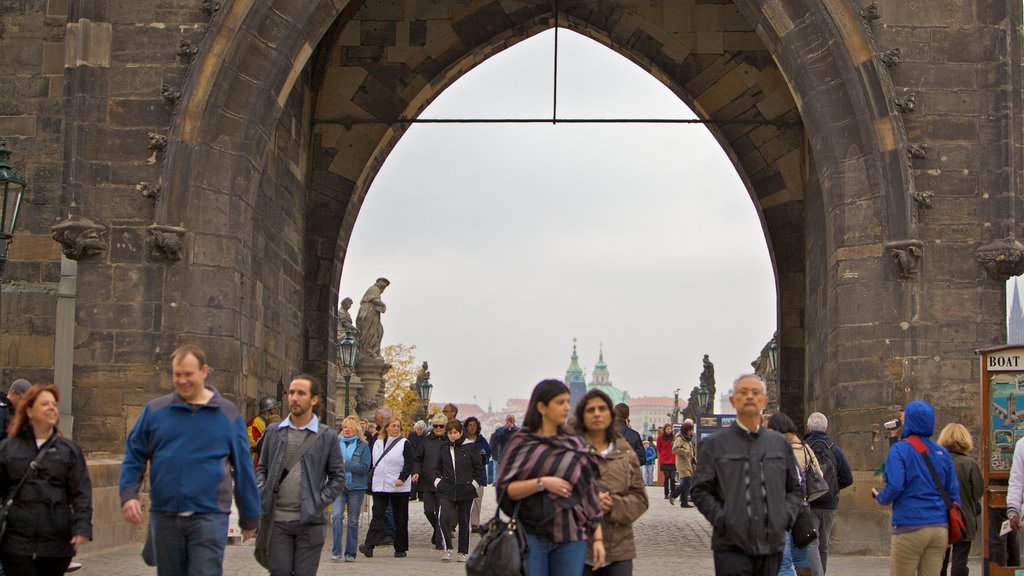 Charles Bridge showing street scenes, heritage architecture and a bridge