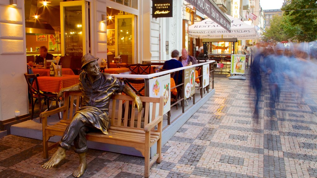 Wenceslas Square showing modern architecture, dining out and street scenes