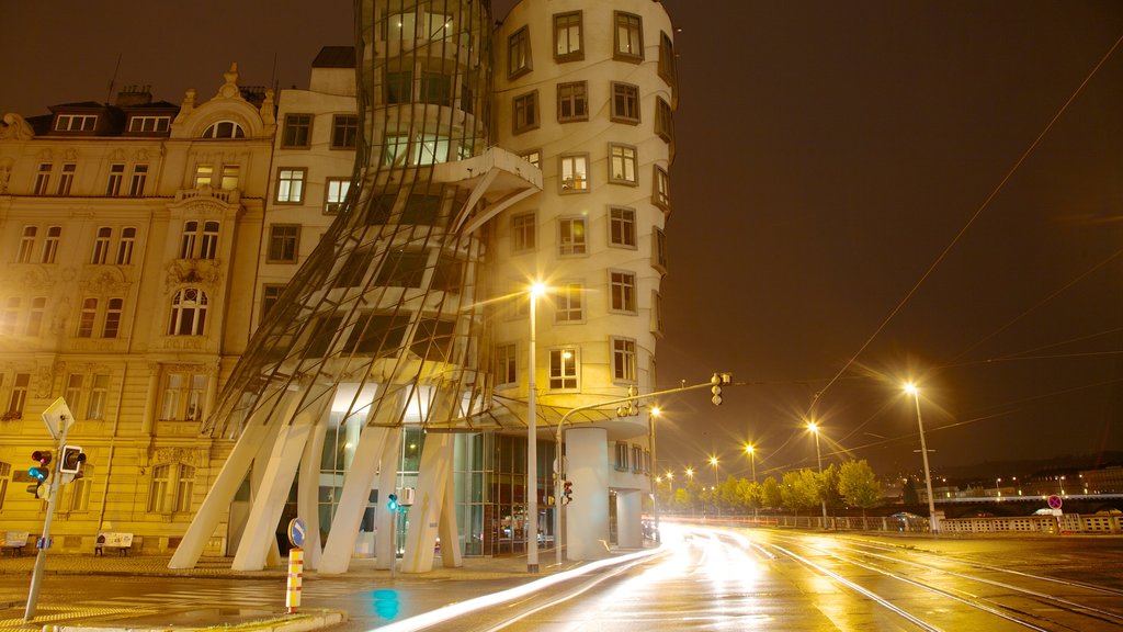 Prague Dancing House showing modern architecture, a city and night scenes