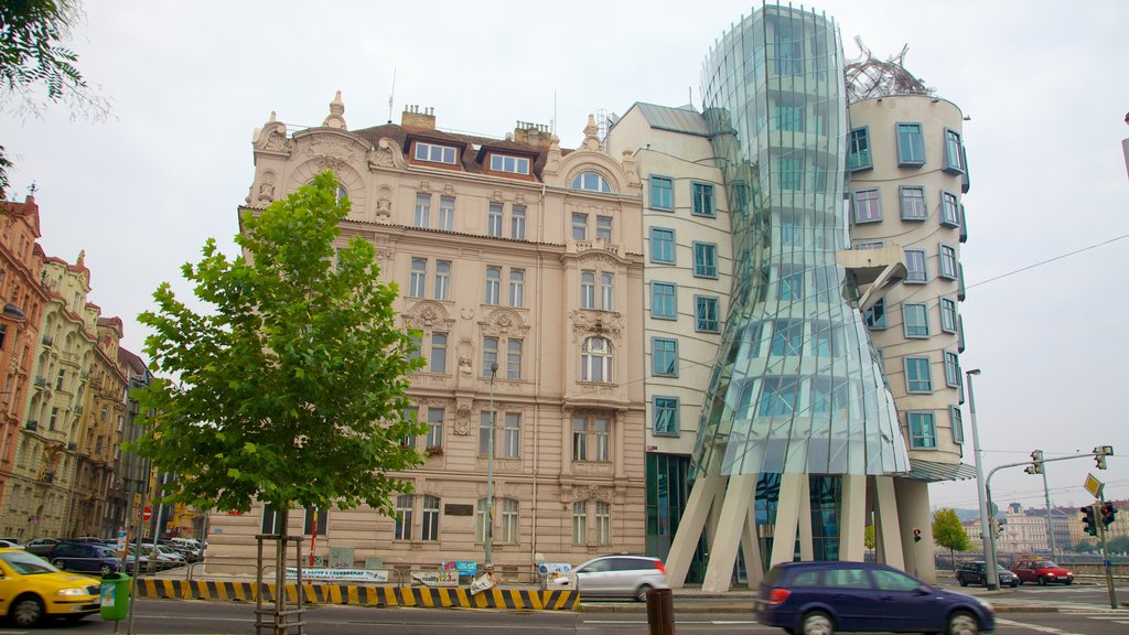 Prague Dancing House which includes modern architecture, street scenes and a city