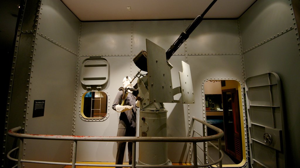 Auckland War Memorial Museum featuring military items and interior views