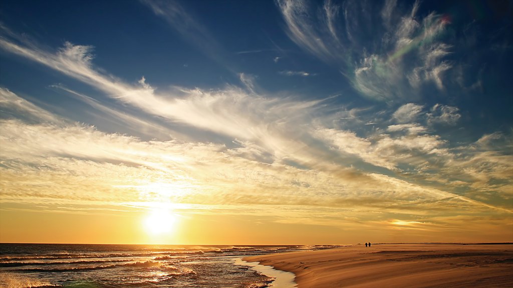 Pensacola Beach showing a sunset, a beach and landscape views