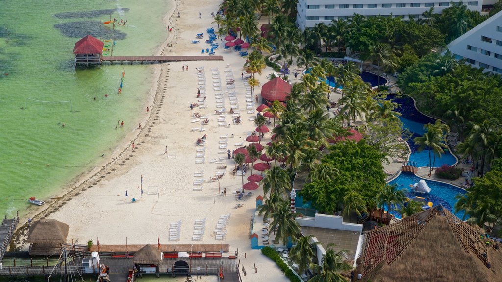 Escenica Tower showing a beach, general coastal views and a luxury hotel or resort