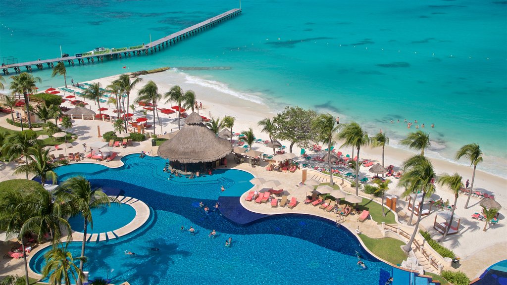 Cancún welches beinhaltet Landschaften, Pool und allgemeine Küstenansicht