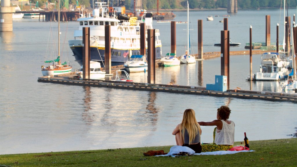 Tom McCall Waterfront Park showing a bay or harbour and picnicking as well as a couple