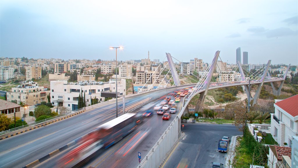 Abdoun Bridge showing landscape views, a bridge and a city