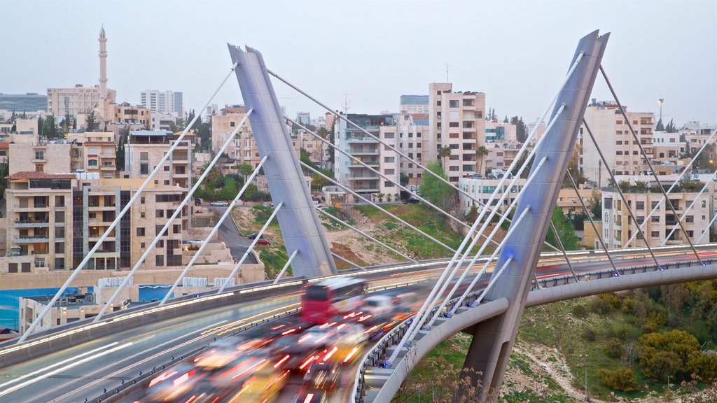 Abdoun Bridge which includes landscape views, a city and a bridge