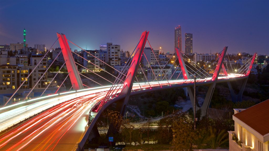 Abdoun Bridge which includes landscape views, a bridge and night scenes