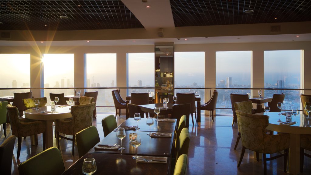 Azrieli Observatory showing a sunset, interior views and dining out