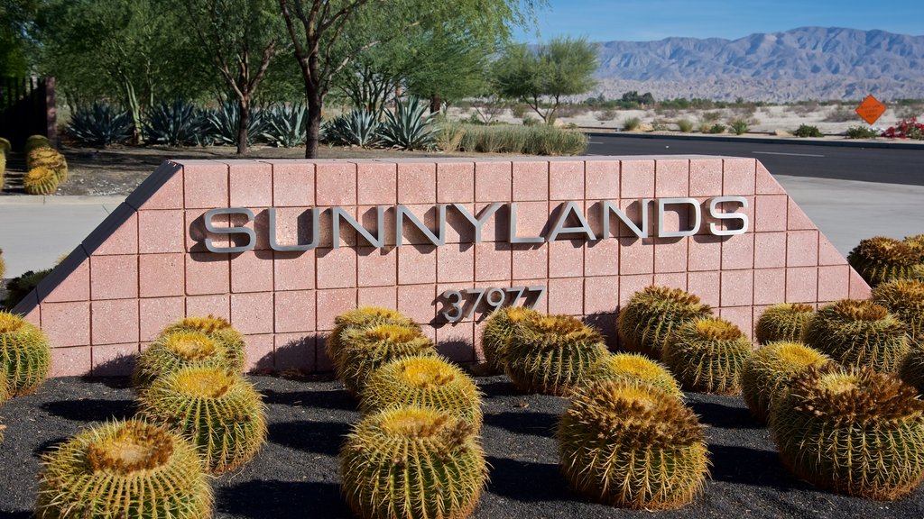 Sunnylands Center and Gardens featuring signage and a park