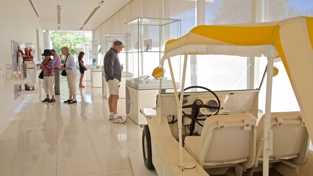 Sunnylands Center and Gardens featuring interior views as well as a small group of people