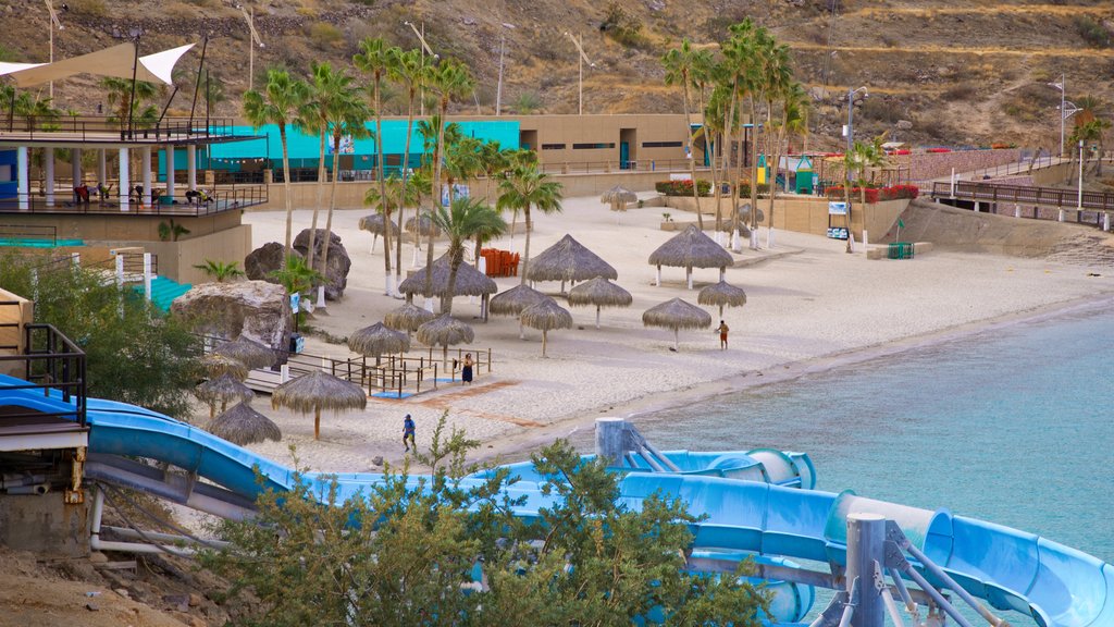 Playa El Coromuel mostrando vistas generales de la costa, escenas tropicales y una playa de arena