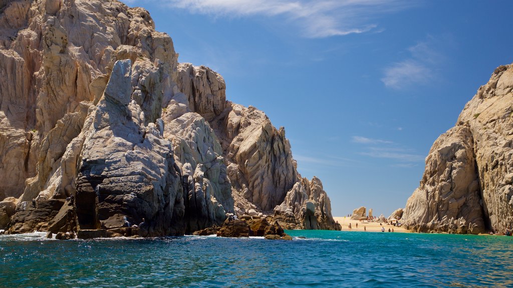 Playa del Amor showing rocky coastline and general coastal views