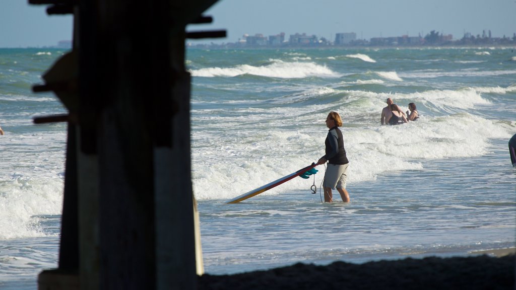 Cocoa Beach Pier which includes general coastal views, surf and surfing