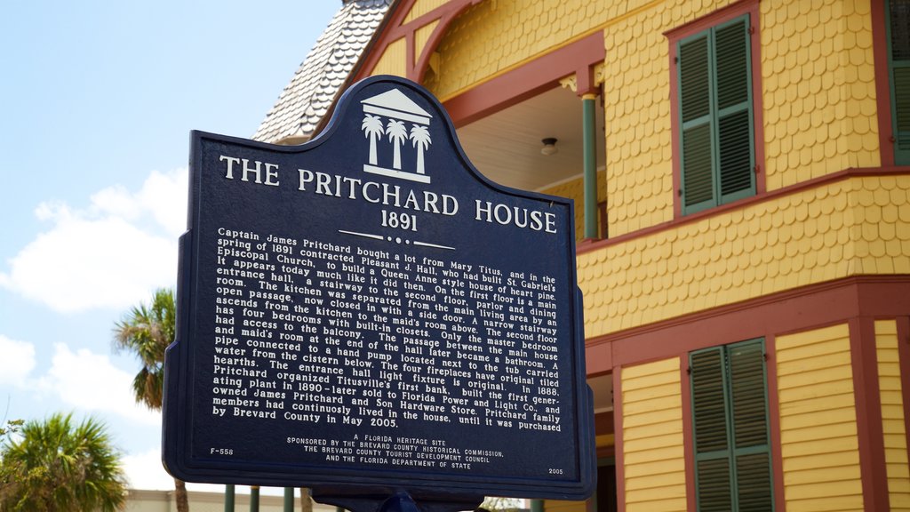 Titusville featuring a house, heritage elements and signage