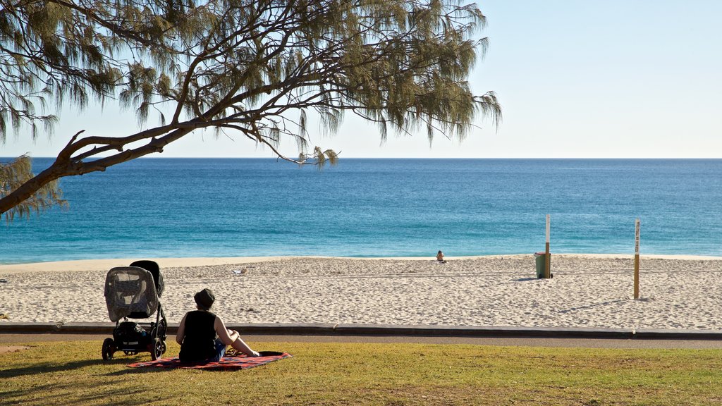 City Beach featuring general coastal views and a sandy beach as well as an individual female