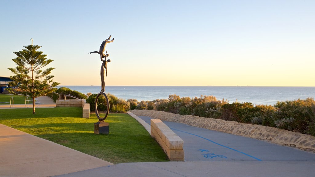 Cottesloe Beach showing general coastal views, a park and outdoor art