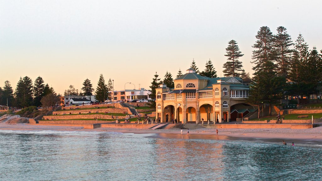 Cottesloe Beach which includes a coastal town, a sunset and general coastal views