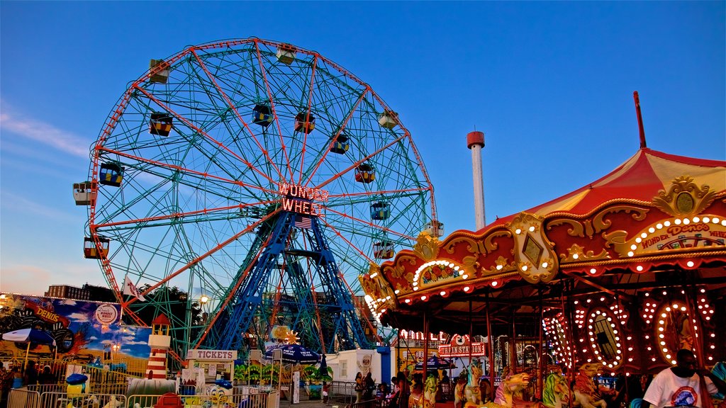 Riegelmann Boardwalk which includes rides and a sunset