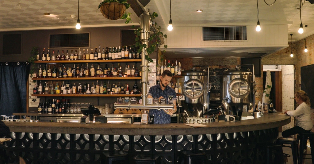 The Catchment Brewing Co. which includes interior views and a bar as well as an individual male