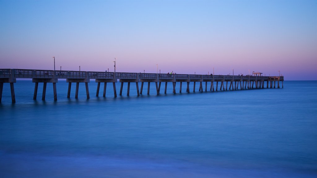 Dania Beach which includes general coastal views and a sunset