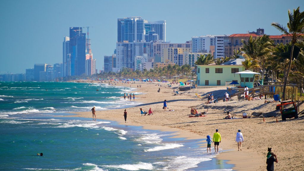 Dania Beach which includes a coastal town, general coastal views and a sandy beach