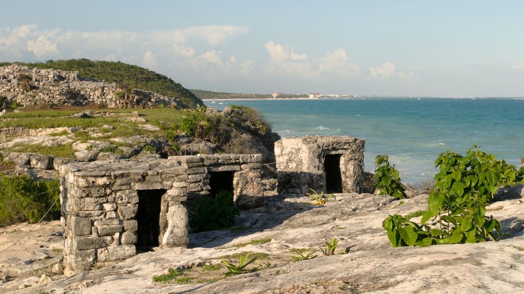 Tulum Mayan Ruins showing rocky coastline and building ruins