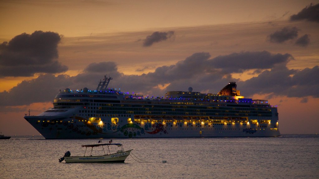 Cozumel showing a sunset, a bay or harbour and cruising