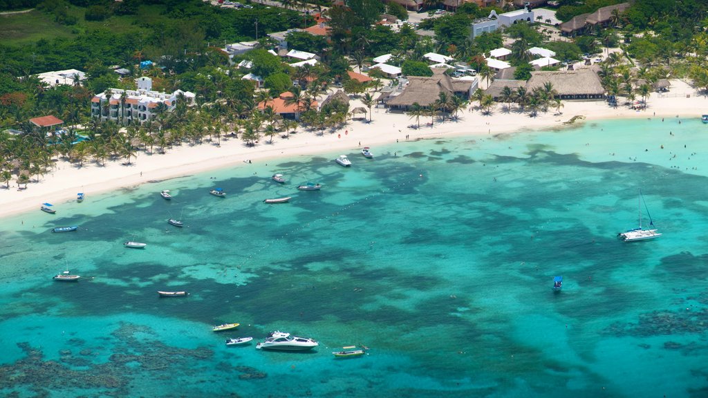 Riviera Maya which includes boating, tropical scenes and a sandy beach