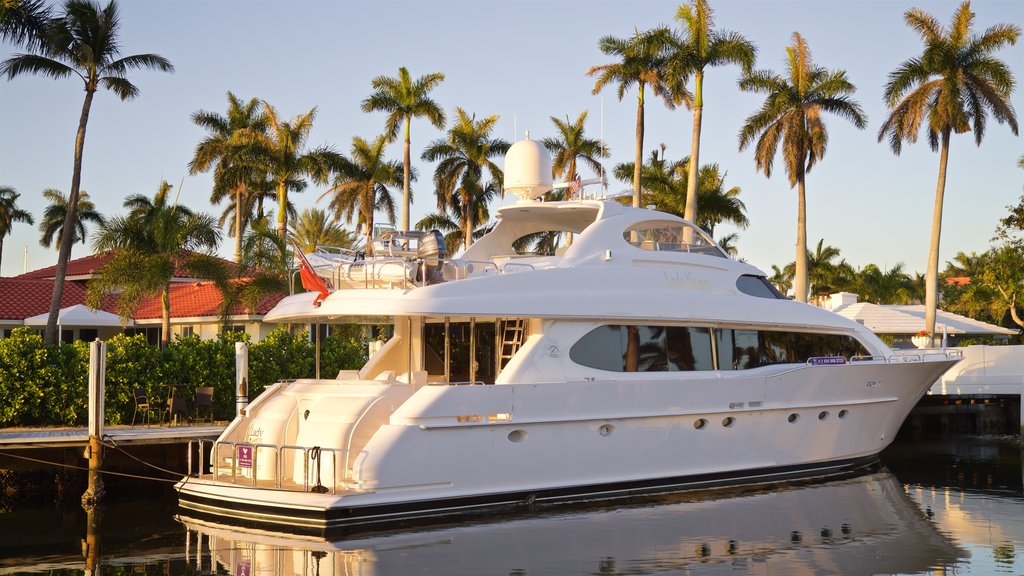 Las Olas Riverfront which includes a bay or harbour and a sunset