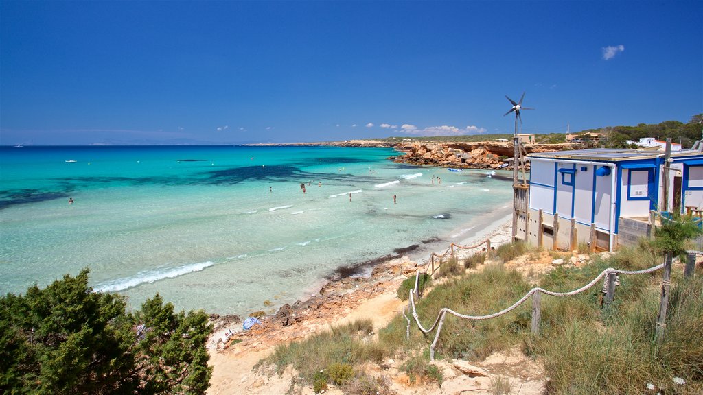 Cala Saona que incluye vista general a la costa y una playa