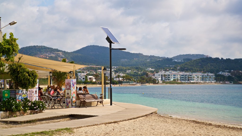 Talamanca Beach showing café scenes, a coastal town and a sandy beach